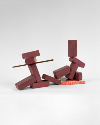 <i>11 brick reclining figure with 1 bar and a Matisse book</i>, 2019