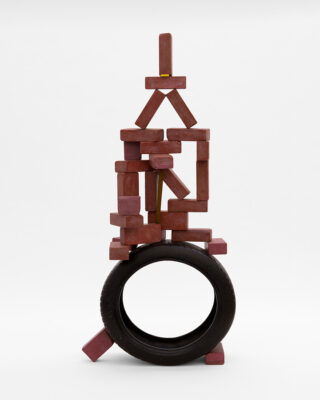 <i>25 brick tower with 1 bar, a matchbook and a tire</i>, 2019